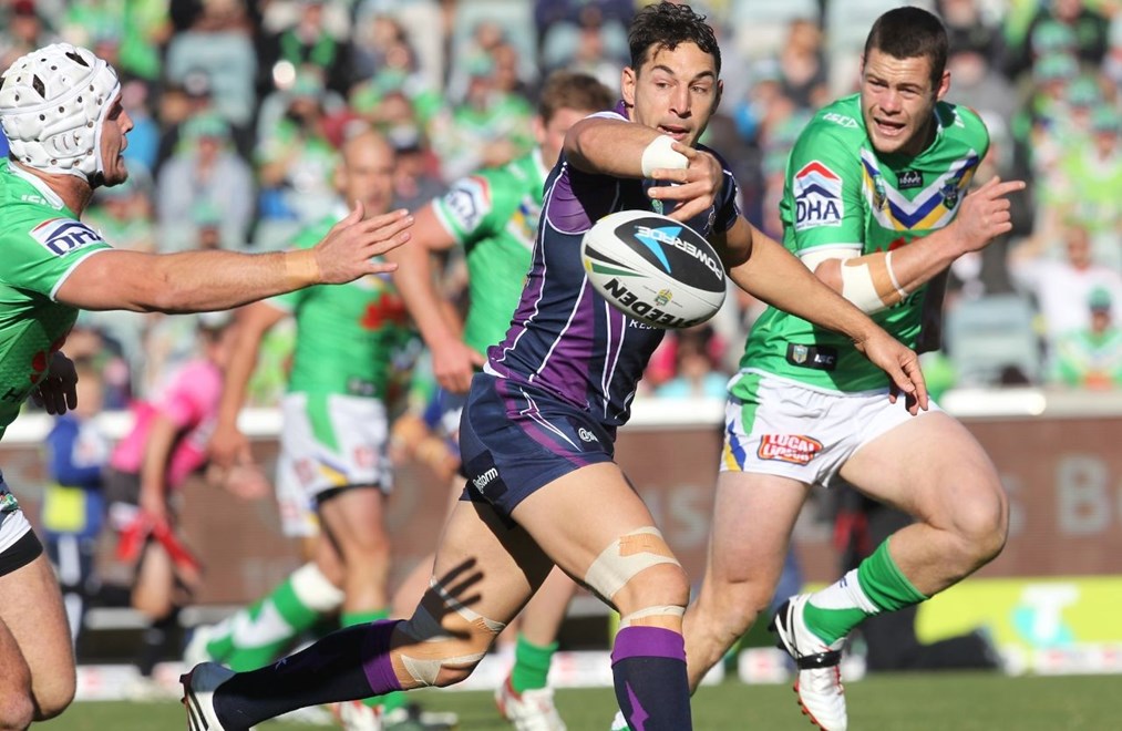 Photo by Colin Whelan copyright Â© nrlphotos.com :     Billy Slater slips a pass   NRL Rugby League, Telstra Cup Round 7 Canberra Raiders v Melbourne Storm at Canberra, Sunday, April 20th  2014.