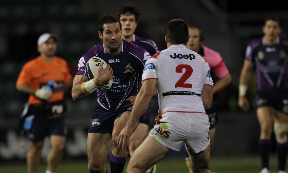 Photo by Colin Whelan copyright Â© nrlphotos.com :         Bryan Norrie sizes up Charlie Runciman                      NRL Rugby League, Round 16 St George Illawarra Dragons v Melbourne Storm at Wollongong, Monday June 30th 2014.