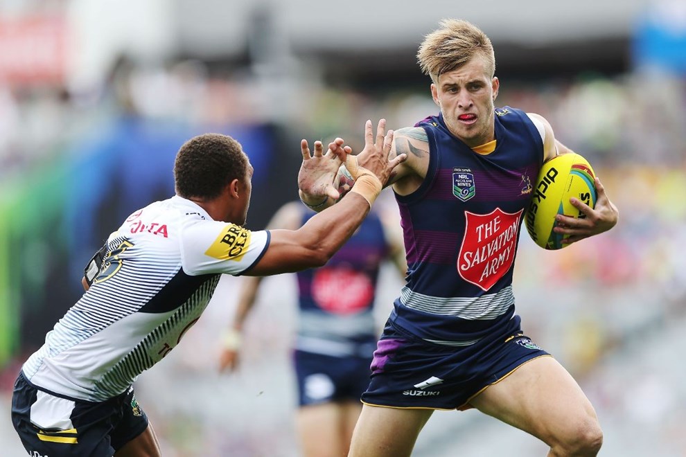 Cameron Munster of the Storm make a run against the Cowboys during Day 1 of the NRL Auckland Nines Rugby League Tournament, Eden Park, Auckland, New Zealand. Saturday 31 January 2015. Copyright Photo: Anthony Au-Yeung / www.photosport.co.nz