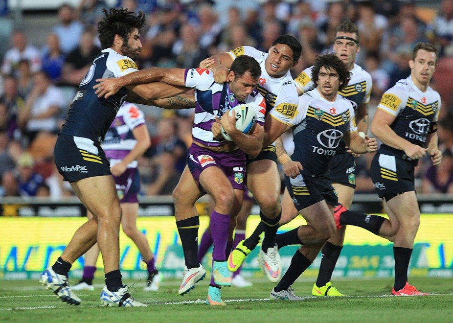 :	Digital Image by Colin Whelan copyright © nriphotos.   Cam Smith grabbed by Jason Taumalolo                 NRL Rugby League, North Queensland Cowboys v Melbourne Storm at Townsville, Monday March 30th 2015.