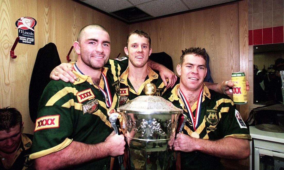 Robbie Kearns, Scott Hill and Brett Kimmorley hold the world cup -Australia v NZ  25/11/00 World cup Final Photo:Colin Whelan©Action Photographics, photographed on colour negative