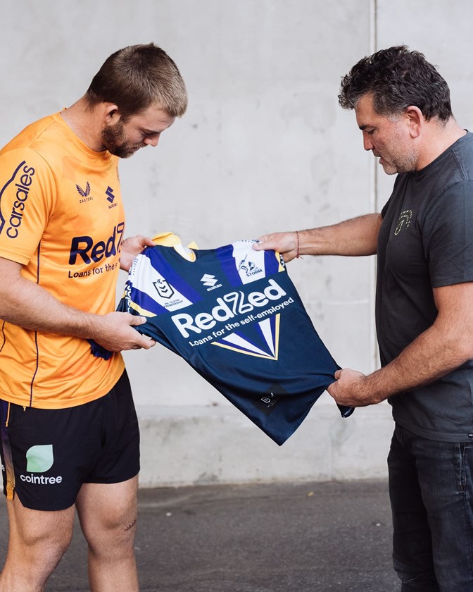 Captain Christian Welch and inaugural team member Robbie Kearns admire the 2023 heritage jersey.