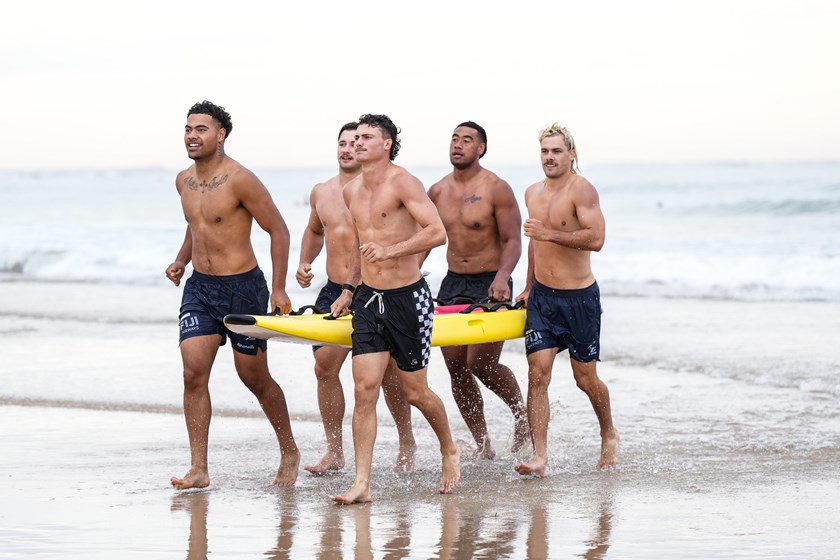 Players undergo a morning training session at Torquay Beach.