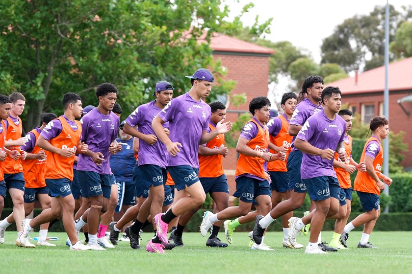 The Harold Matthews squad warming-up before training.